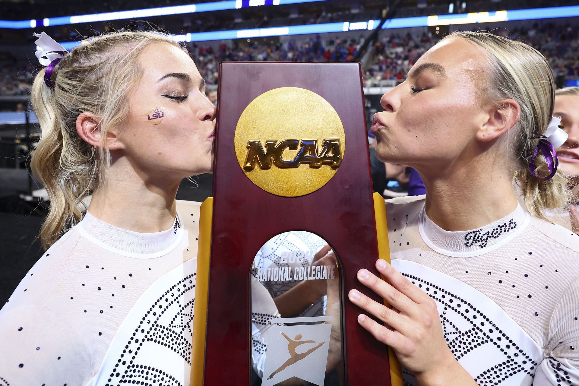Olivia Dunne alongside Chase Brock during the Division I Women's Gymnastics Championships in Fort Worth, Texas. (Photo via Getty Images)